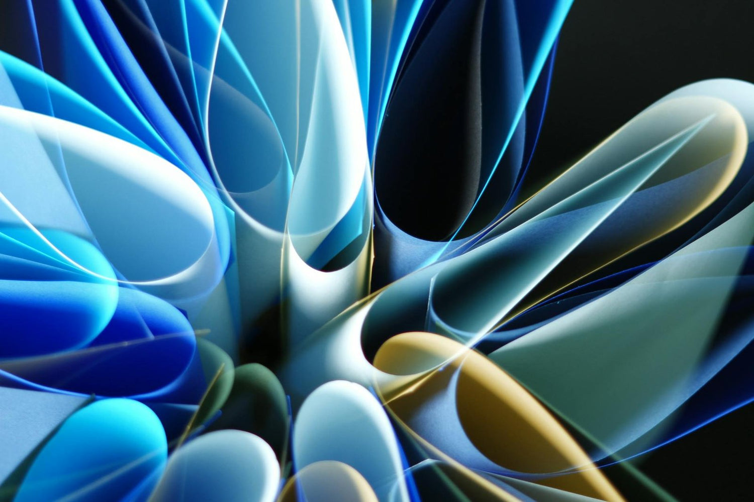 Vibrant abstract image featuring intricate blue and yellow light patterns in a dynamic design.